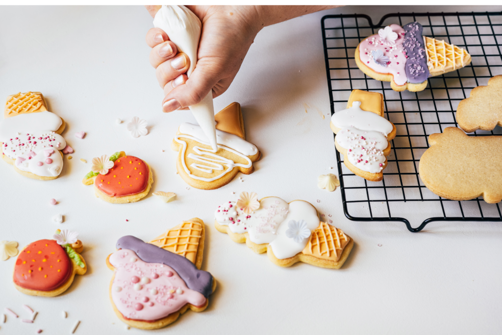 Decorating cookies is one way party entertainment and souvenirs can merge.